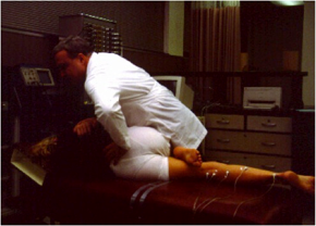Image shows HVLA spinal manipulation being performed.